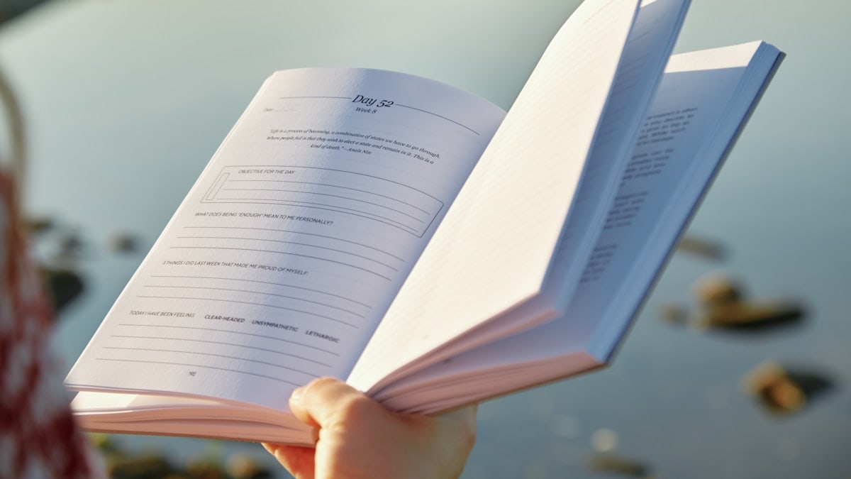 A person holding a book in their hands